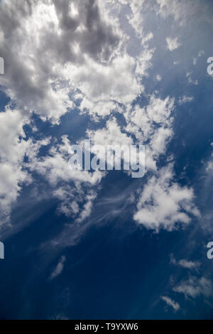 mixed zenith clouds at noon daylight wide angle shot. Stock Photo