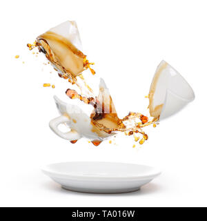 Broken coffee mug with splash of coffee. Isolated on white Stock Photo