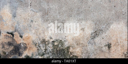 Dark plaster wall with dirty cracked scratched background. Old retro vintage brickwall with peel grey stucco texture Stock Photo