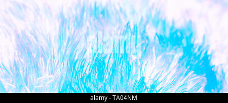 Texture of fluffy blue neon fabric in neon pastel colors. macro Stock Photo