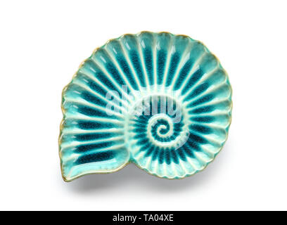 Stylish plate in shape of seashell on white background Stock Photo