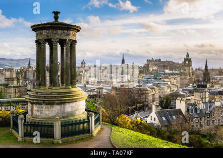 View of Edinburgh City Centre form From Calton Hill on a Clear Winter Day. A monument is in foreground.