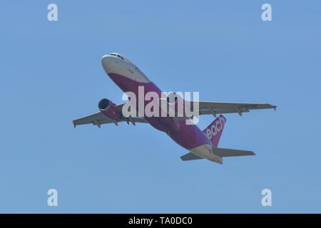 Osaka, Japan - Apr 18, 2019.  JA809P Peach Airbus A320 taking off from Kansai Airport (KIX) in Osaka, Japan. Stock Photo