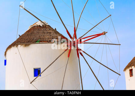 Mykonos, Greece, greek iconic windmill close-up background in famous island in Cyclades Stock Photo
