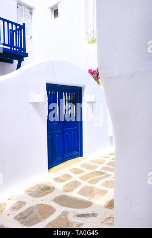 Greek traditional architecture, street view with white and blue house close-up Stock Photo