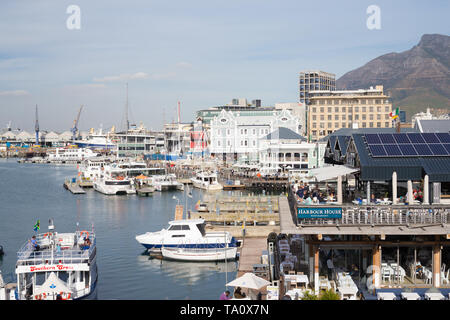 scenic view over the shops, restaurants and buildings in the harbour at V&A Waterfront in Cape Town, South Africa on an Autumn day Stock Photo