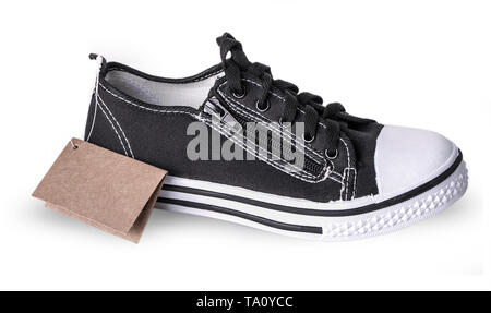 New sneakers with a label isolated on a white background Stock Photo
