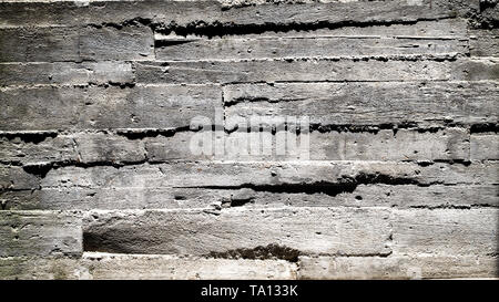 Board Formed Concrete Texture wall background sunlight and shadow on rough surface facade idea exterior wall. Stock Photo