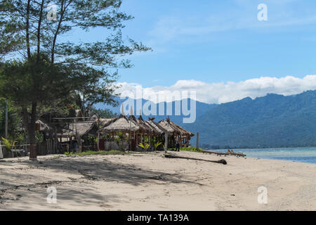 GILI AIR, INDONESIA - December 01, 2013: Pristine Waters and a white Sandy Beach on Gili Air. One of the three popular Gili Islands near Lombok. Stock Photo