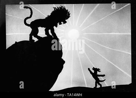 This photo shows a scene from the silhouette film 'Dr. Dolittle and His Animals' - subtitle: 'The Adventures of Doctor Dolittle: The Lion's Den' by Charlotte Reiniger. The silhouette film, also known as silhouette animation, is a technique of animated film in which silhouettes are put together on a lighted glass plate in front of a white or black background to form a film. The result is the silhouette film, inspired by shadow theater and the pictorial techniques of silhouette cutting.