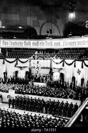 View of the Berlin Sportpalast during the rally of the Luftwaffe Propaganda Week. Reichsmarschall Hermann Goering had ordered this event. In the background, a banner with the inscription 'The German nation must become a nation of airmen'. Stock Photo