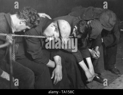 Sleep On Rope Unemployed sleeping on a rope for a few pennies Stock Photo - Alamy