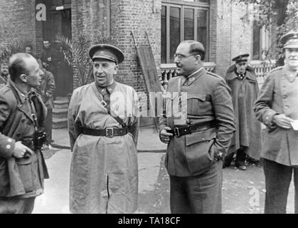 Photo of three commanders after the end of the siege of the northern Spanish city in Oviedo, Asturias, Spain on October 24, 1936. The city garrison was formed under Colonel Antonio Aranda against the government troops on July 19, and resisted the siege of government troops until October 16, when nationalist troops came to the rescue. From left to right: Teniente Coronel (lieutenant-colonel) María Alonso, who was the first to enter the besieged city, General Luis Orgaz Yoldi (commander of the Moroccan troops), General Antonio Aranda Mata (commander of the garrison of Oviedo). Stock Photo