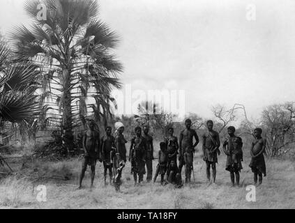 san bushmen family in hunting day in the kalahari desert of central ...