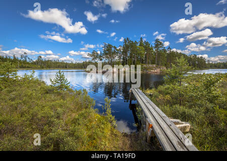 Lake with landing-stage in Glaskogen nature reserve Sweden Stock Photo