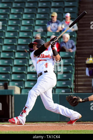 Fargo, ND, USA. 20th May, 2019. FM Redhawks Leobaldo Pina (4) swings at a pitch during the FM Redhawks game against the Milwaukee Milkmen in American Association professional baseball at Newman Outdoor Field in Fargo, ND. Milwaukee won 5-3. Photo by Russell Hons/CSM/Alamy Live News Stock Photo