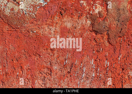 monocolor orange painted flat concrete surface closeup texture. Stock Photo