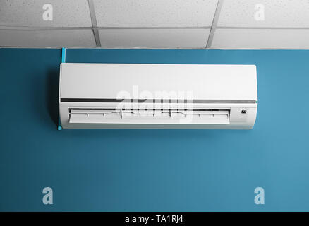 Modern air conditioner on wall Stock Photo