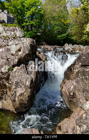 Betws y Coed Conwy Wales May 14, 2019 Small falls on the river Llugwy as it flows through the village Stock Photo