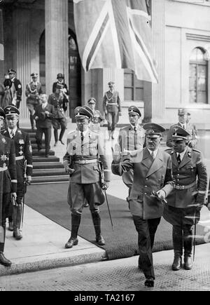The Nazi leader with Martin Bormann, who became one of the most influential Nazi officials, here at the Munich Conference before the Fuehrerbau (Koeniglicher Platz) in September 1938. Left adjutant Julius Schaub, far left Karl Wolff. Stock Photo