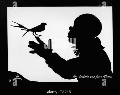 This photo shows a scene from the silhouette film 'Dr. Dolittle and his Animals' by Charlotte Reiniger. The silhouette film, also known as silhouette animation, is a technique of animated film in which silhouettes are put together on a lighted glass plate in front of a white or black background to form a film. The result is the silhouette film, inspired by shadow theater and the pictorial techniques of silhouette cutting.