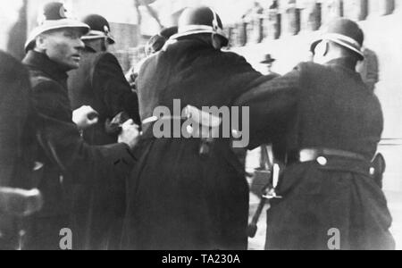 At the demonstration in Teplitz-Schoenau (today Teplice), the deputy of the Sudeten German Party, Karl Hermann Frank, is arrested by police officers. Since the seizure of power of the National Socialists in Germany, the conflicts between the Sudeten German minority and the Czechoslovaks had intensified. Stock Photo