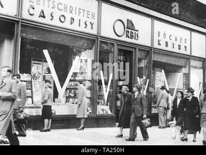 V signs in the shop windows of a Prague bookstore. The V is the symbol of the victory of National Socialism in Germany. Hitler started World War II by attacking Poland in September. Stock Photo