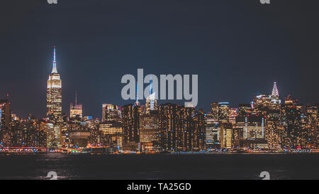 New York City, New York, USA. Day and night skylines from Brooklyn plus NYPD police car in Times Square. Stock Photo