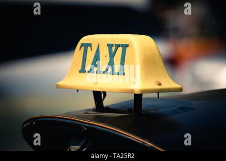 taxi sign on top of tuktuk in Bangkok , Thailand Stock Photo
