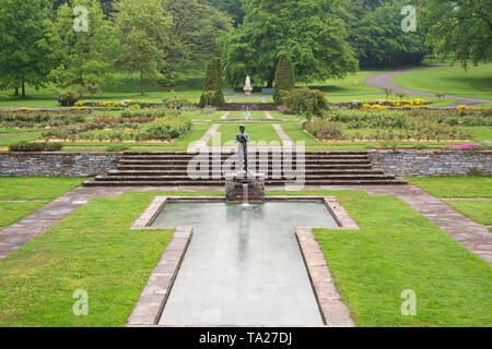 The Flute Player (Flûtiste adolescent) by Henri König - The Rose Garden - Parc La Grange - Geneva Stock Photo