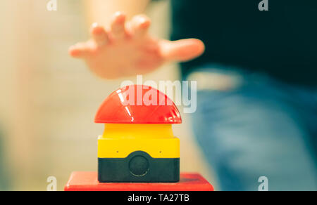 Worker has to press the emergency button fast. Stock Photo