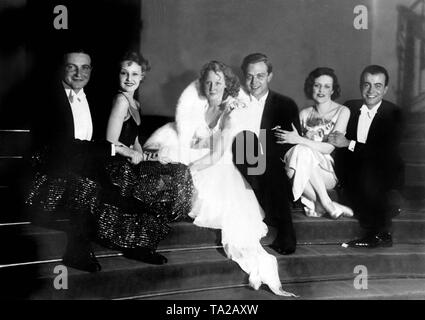 The actors Willy Fritsch, Lilian Harvey, Brigitte Helm, Gustav Froehlich, Rina Marsa, Oswaldo Valentini at the first large ball organized by the top organization of the German film industry. The film ball took place at Kroll (Krolloper) in December 1928. Stock Photo