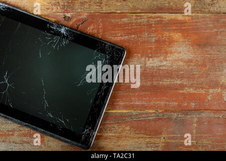 Cracked tablet digital computer with broken screen Stock Photo