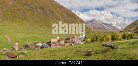 Panoramic view of the village Ushguli at the foot of the mountain Shkhara. Picturesque beautiful Caucasus landscape, Upper Svaneti, Georgia Stock Photo