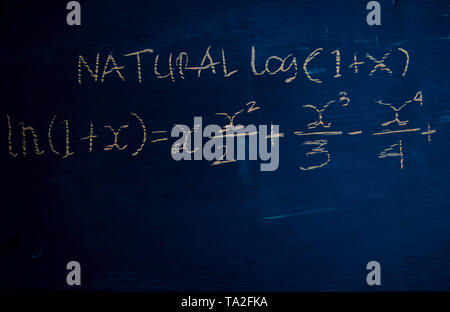 Close up math formulas written on a blackboard. Education concept Stock Photo