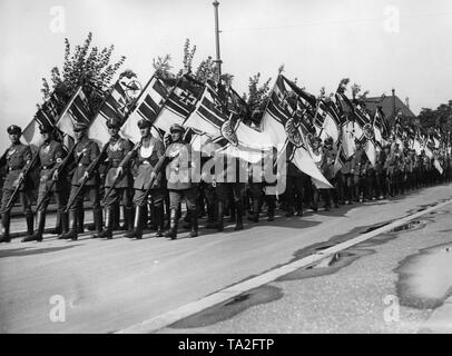 At the muster of the Reichsfuehrer of the Stahlhelm, the flagbearers are marching into the stadium of Hanover. Here, the Silesian delegation. Stock Photo