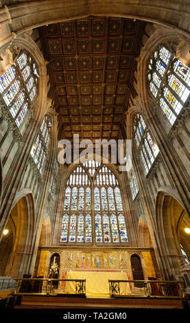 Malvern Priory aka Great Malvern Priory - interior showing the altar and 15th century stained glass windows, malvern, Worcestershire UK Stock Photo