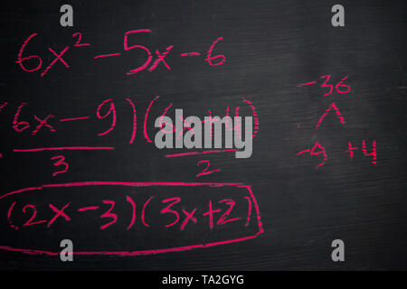 Close up math formulas written on a blackboard. Education concept Stock Photo