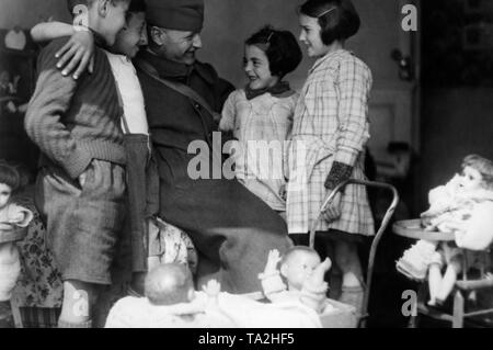 A former French soldier released from captivity after returning to his family. He was released because he has four children. Stock Photo