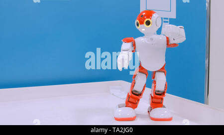 Humanoid robot dancing Stock Photo