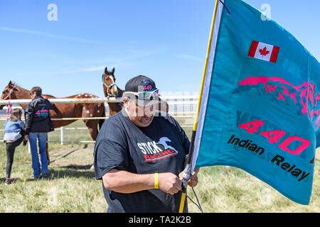 Canadian Indian Relay (horse) Race, Team 440 Nation flag displayed by a race captain/owner at the Rodeo Grounds in Bonnyville Alberta Canada. Stock Photo