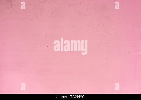 Concrete wall painted light pink Stock Photo