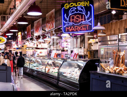 Philadelphia, Pennsylvania, USA - 26 April 2019: Golden Fish Market inside of Reading Market in Philadelphia with people shopping. Stock Photo