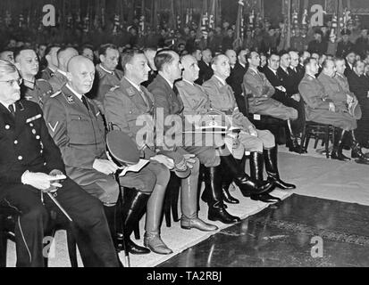 On the evening of January 29, 1943, NSDAP leaders gathered at an event. First row from left to right: Otto Meissner, Hans Heinrich Lammers, Viktor Lutze, Albert Speer and Robert Ley. Stock Photo