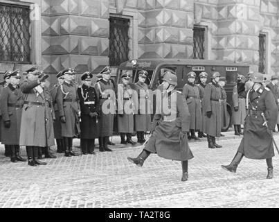 The Commander of the city of Prague, Kurt von Briesen (right), marches past the members of the Wehrmacht in Prague. The first Slovak Republic was founded on Hitler's command in March 1939, and Bohemia and Moravia were occupied by the Wehrmacht. Stock Photo