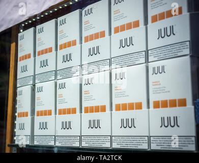 A selection of the popular Juul brand vaping supplies and third-party  replacement pods, on display in the window of a vaping store in New York on  Saturday, May 11, 2019. (© Richard