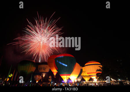 balloon festival with fireworks Stock Photo