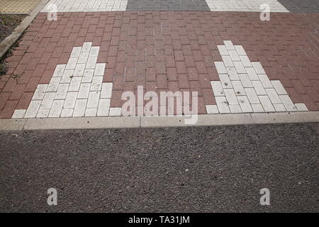 Brick patterns on the road Stock Photo