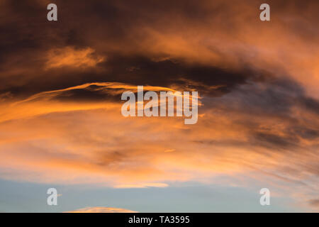 Clouds illuminated by morning sun Stock Photo