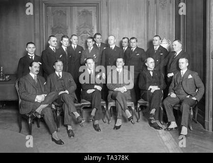 At the invitation of Lufthansa, representatives of the most important European airlines gathered in Berlin to coordinate their flight plans. In the middle (sitting, in a gray suit) director of the Deutsche Lufthansa, Wronsky. Stock Photo